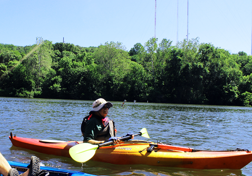 Carl Raring heads toward the finish of his 18th Sojourn. He's been paddling on local waters for over 40 years. Credit: Brian Rademaekers